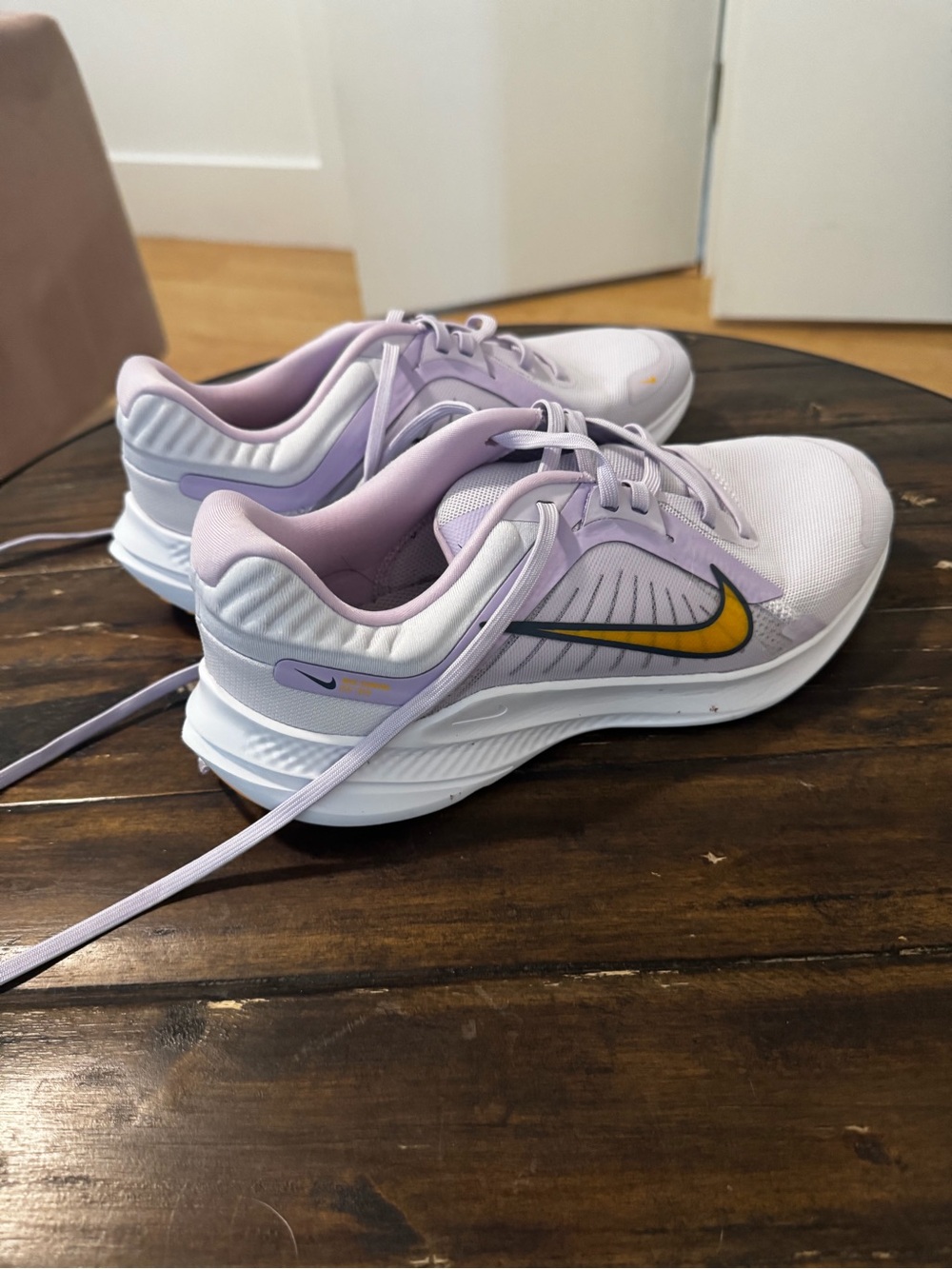 Nike Women's Light Lavender Running Sneakers with Yellow Swoosh
